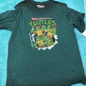 NINJA TURTLES MENS SHIRT
SIZE LARGE
BRAND NEW